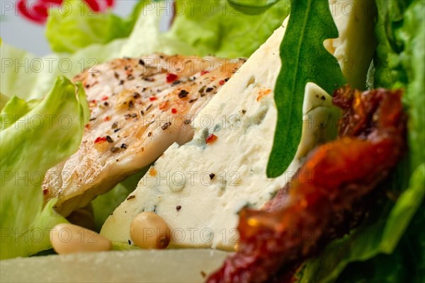 Macro photo of salad with roasted turkey