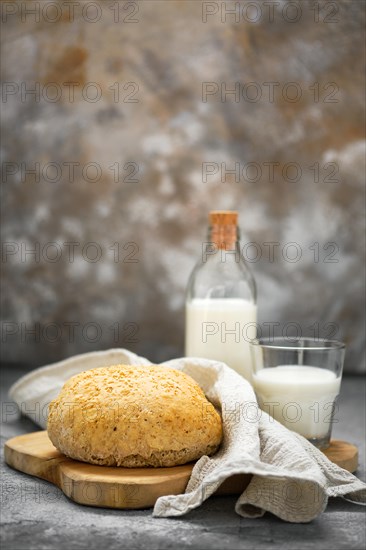 Healthy breakfast with fresh homemade yeast-free bread and milk