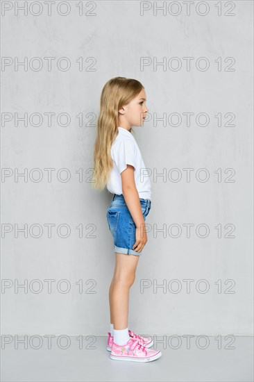 Little child girl in white t-shirt