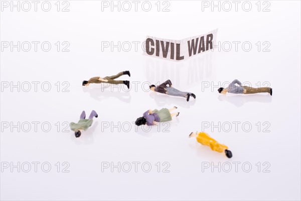 Human Figures near torn Newspaper Title