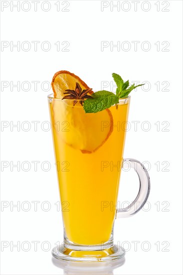 Hot pear and orange winter drink with mint isolated on white