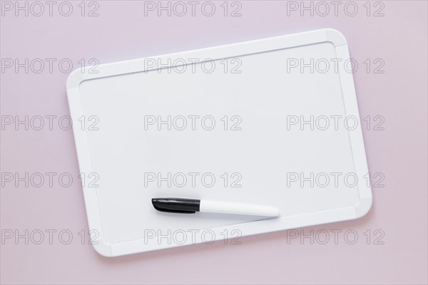 Flat lay whiteboard with marker top