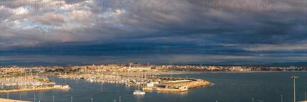 Dramatic sky and clouds during a storm over Port of Valencia