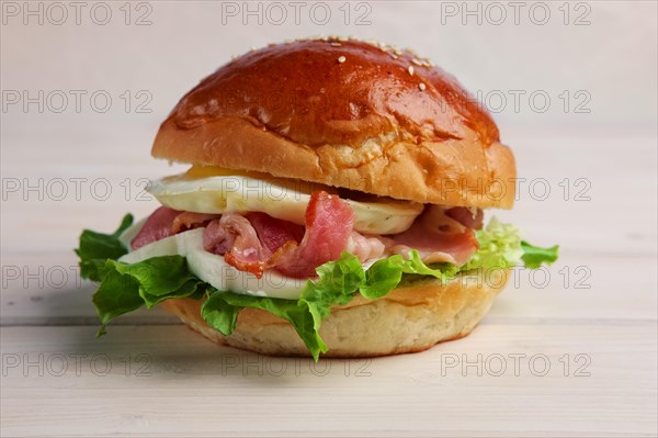 Soft focus photo of burger with mozzarella