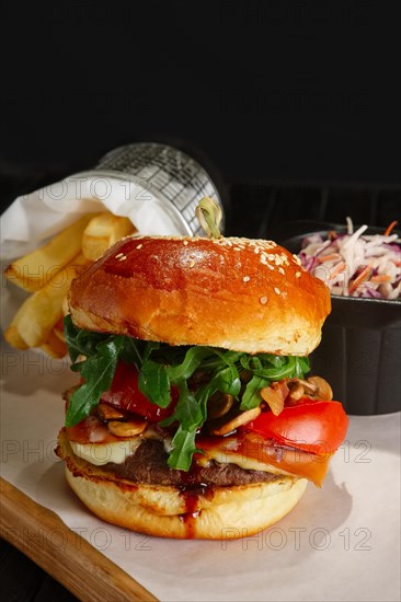 Juicy beef burger with lingonberry sauce