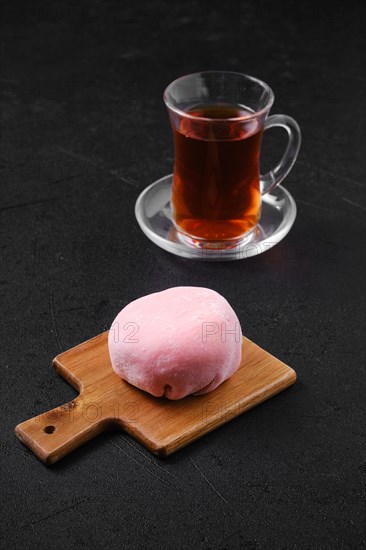 Sweet dessert mochi with strawberry with fruit tea