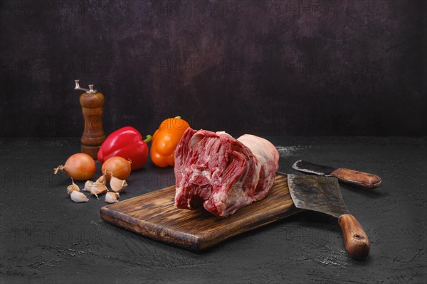 Raw fresh lamb neck meat on cutting board