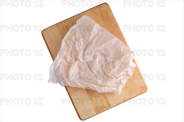 Crumpled parchment for baking isolated on white