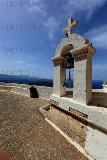 Bell tower of the monastery in the mountains near the coastal road to Agios Nikolaos
