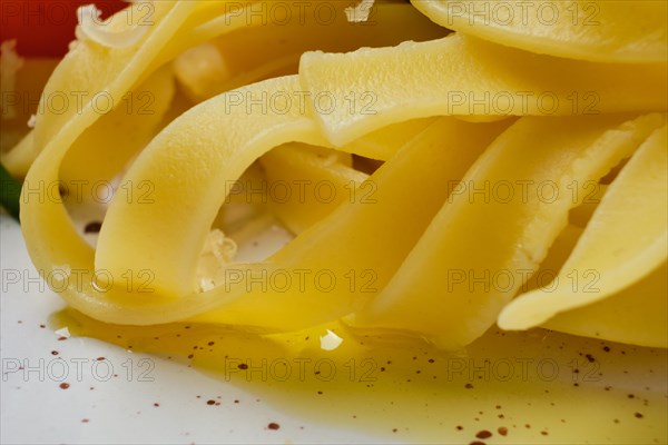 Macro photo with shallow depth of field of pasta on plate