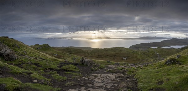 Sunbeams through sky