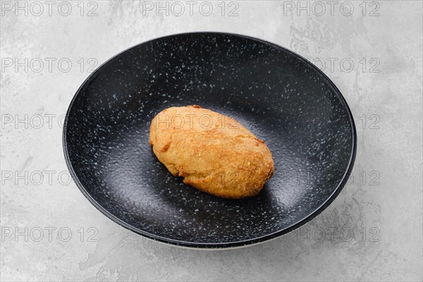 Kiev or pozharskaya cutlet on a plate