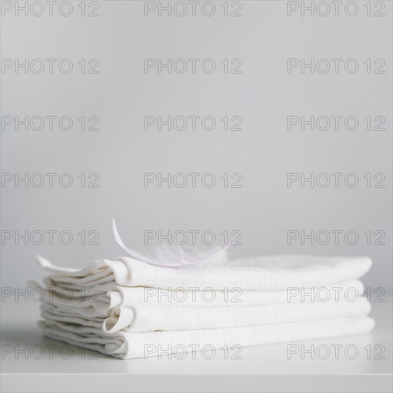 Front view stacked white towels