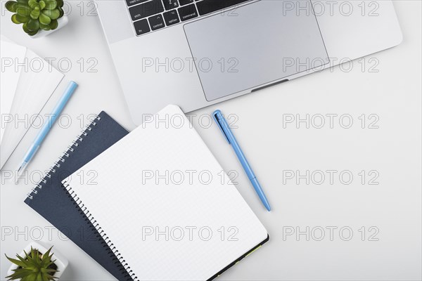 Opened notepad with laptop top view. Resolution and high quality beautiful photo