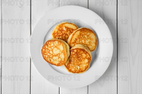 Overhead view of plate with traditional belarussian pancakes