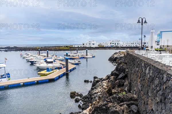 Marina and white buildings in beautiful Corralejo