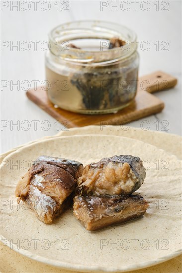 Closeup view of canned mackerel on a plate