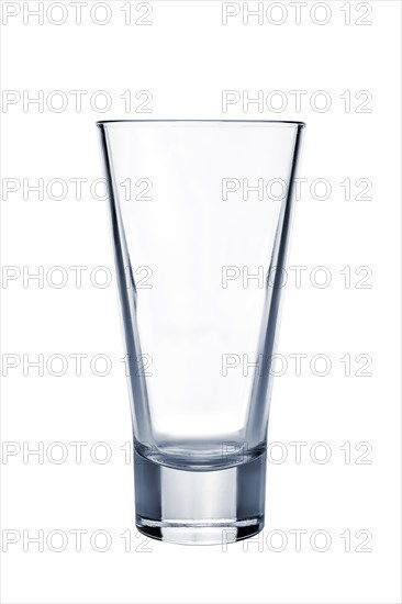 Transparent empty highball glass with reflection isolated on white