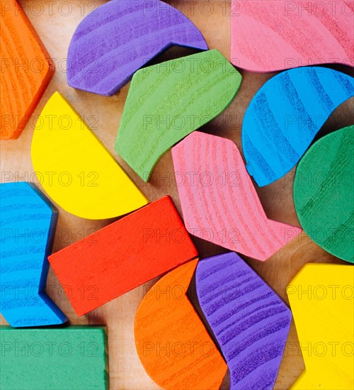 Colorful wooden pieces of a logic puzzle