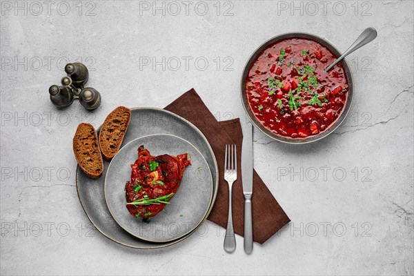 Top view of ossobuco on a plate. Slice of shank baked with wine sauce