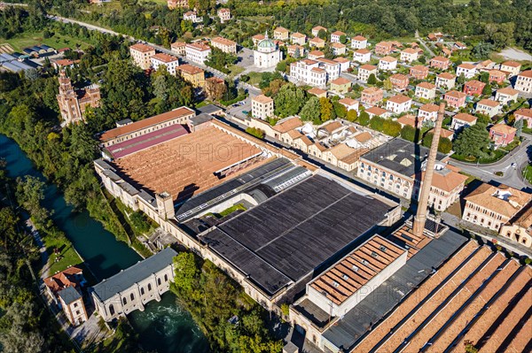 Aerial of the Unesco world heritage site "company town". Crespi dÂ´Adda