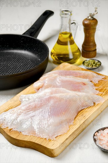 Closeup view of raw fresh peeled stingray wings ready for frying