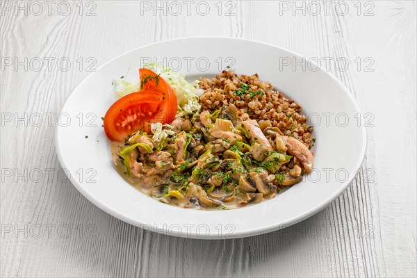 Plate with chicken goulash