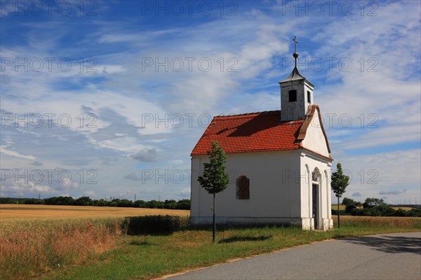 Small abandoned chapel in front of the power plant