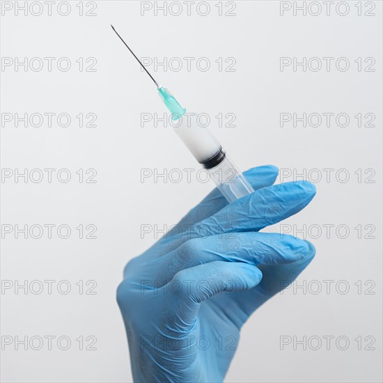 Doctor preparing vaccine