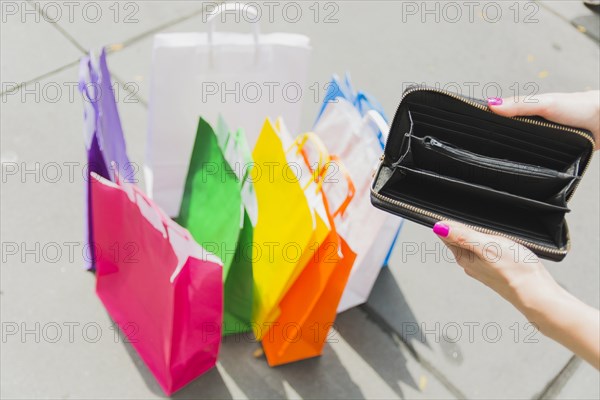 Empty wallet female hands