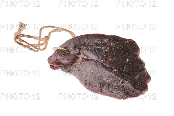 Overhead view of dried jerked deer or venison meat isolated on white background