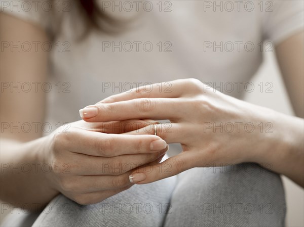 Female removing marriage ring
