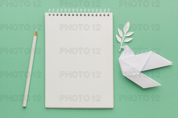 Top view notebook with paper dove pencil. Resolution and high quality beautiful photo