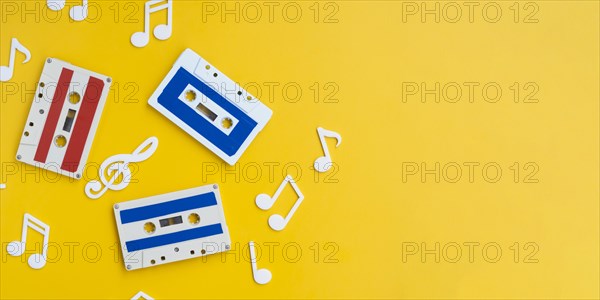 Colorful cassette tapes bright background with copy space