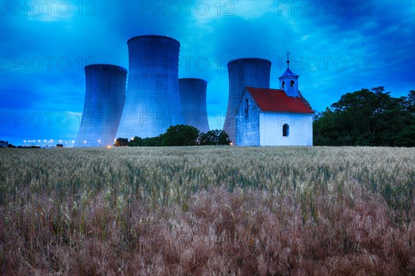 Small abandoned chapel in front of the power plant