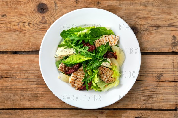 Overhead view of salad with roasted turkey