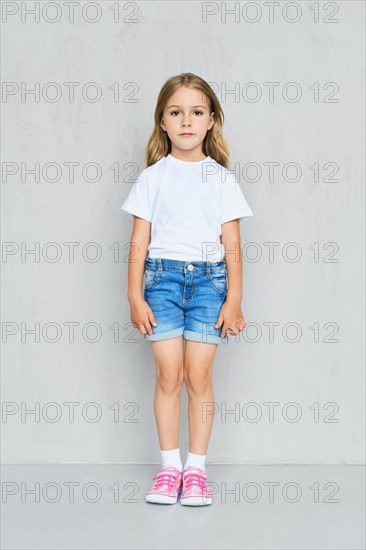 Little child girl in white t-shirt