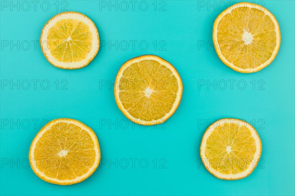 Pattern sliced juicy oranges