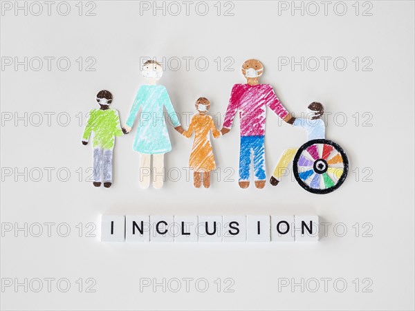 Family with disables person cutout paper inclusion concept