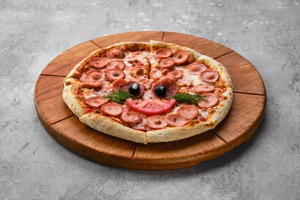 Pizza for kids with sausage and cheese