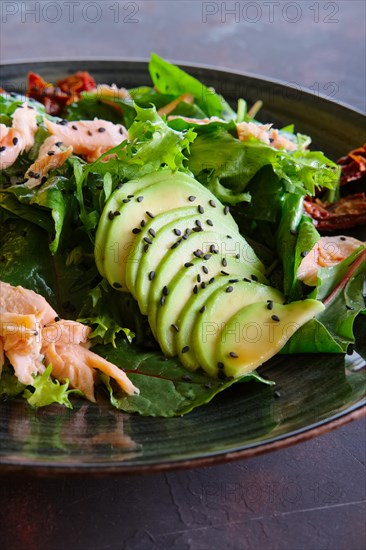 Closeup view of salad with salmon