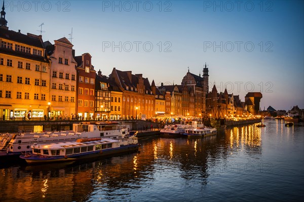 Hanseatic league houses on the Motlawa river at sunset