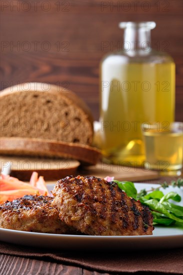 Grilled beef cutlet with fresh salad