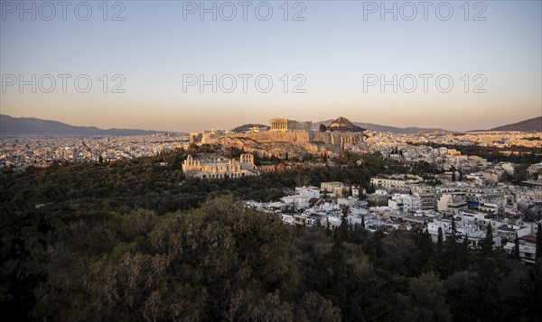 View from Philopappos Hill over the city at sunset