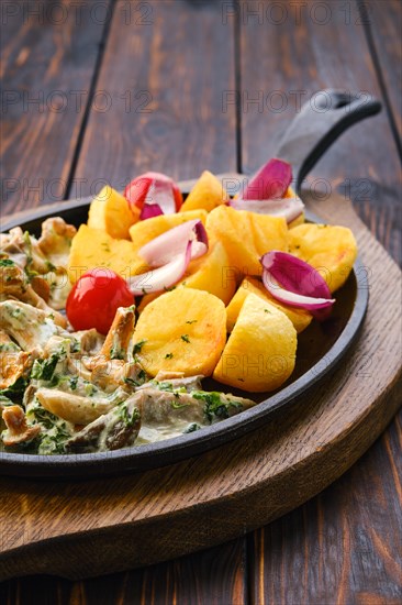 Cast iron skillet with fried chanterelles