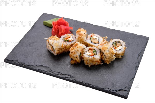 Rolls with tuna and avocado on slate plate