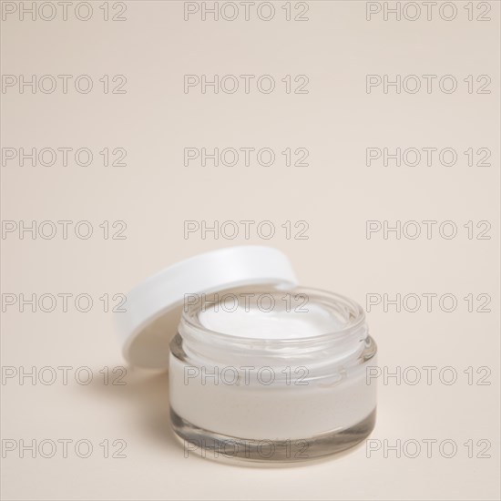 Close up shot body cream with plain background
