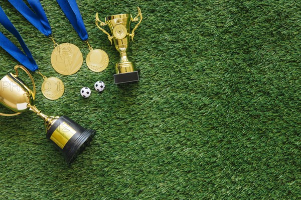 Football background with medals trophy