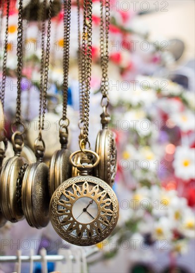 Set of retro styled pocket watches hanging