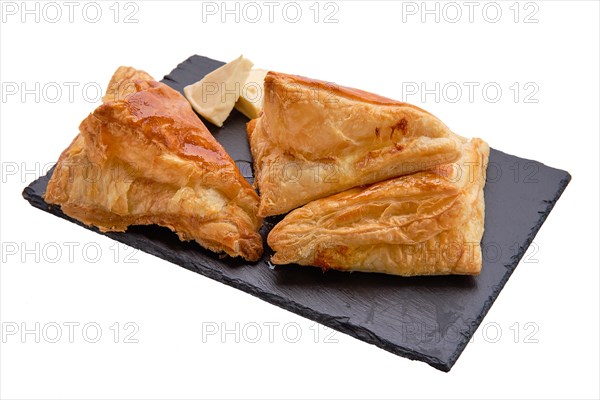 Puff pastry with cheese on slate plate